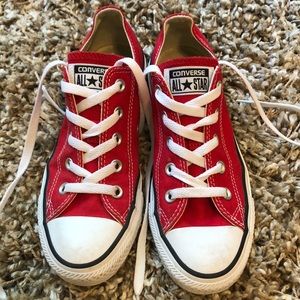 Red low top converse sneakers